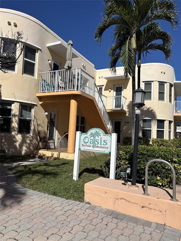 a view of a building with a porch
