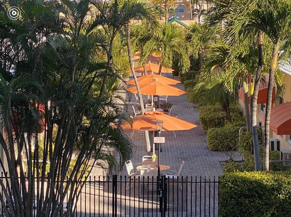 330 Arthur Street, Unit 115 Hollywood, FL 33019 - Photo 13 of 17 a view of a backyard