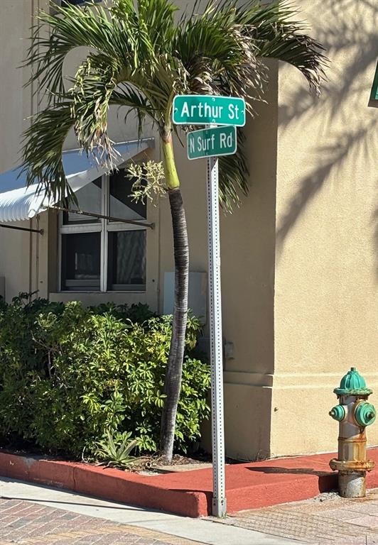 330 Arthur Street, Unit 115 Hollywood, FL 33019 - Photo 16 of 17 a sign that is on the side of a building