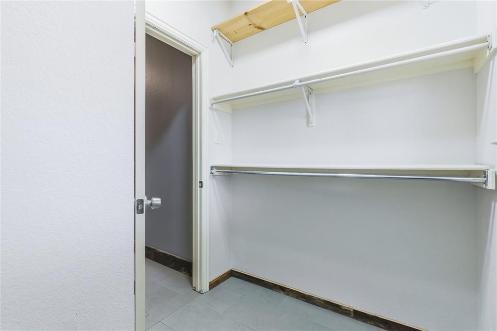 5914 Ambassador Lane Rowlett, TX 75089 - Photo 17 of 40 an empty room with a door