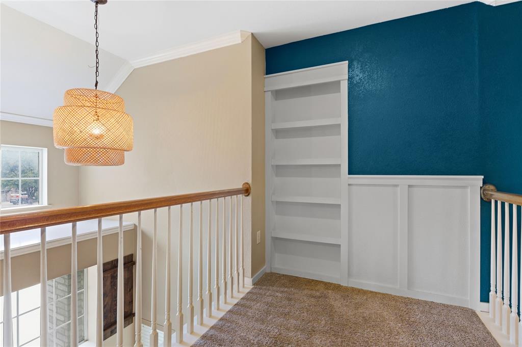 5914 Ambassador Lane Rowlett, TX 75089 - Photo 20 of 40 a view of a hallway with a cabinet