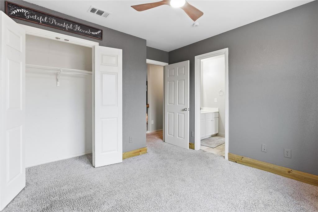 5914 Ambassador Lane Rowlett, TX 75089 - Photo 24 of 40 an empty room with chandelier fan