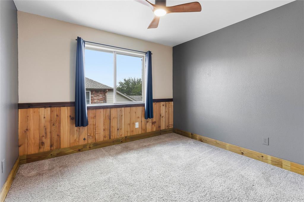5914 Ambassador Lane Rowlett, TX 75089 - Photo 25 of 40 an empty room with windows