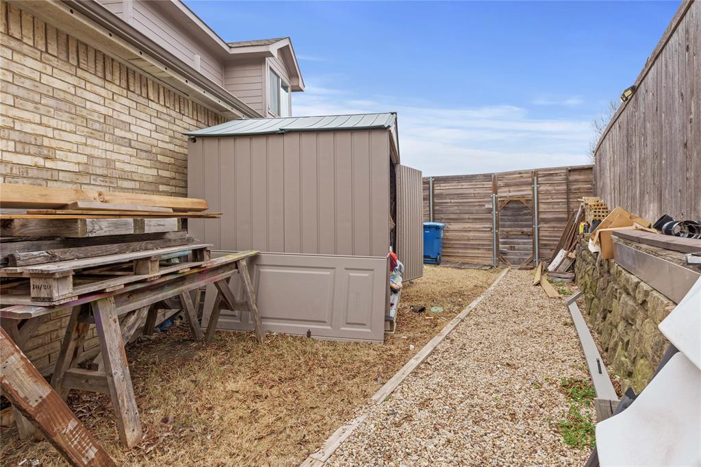 5914 Ambassador Lane Rowlett, TX 75089 - Photo 33 of 40 a view of a patio with a table and chairs