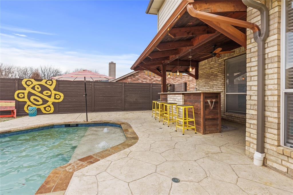 5914 Ambassador Lane Rowlett, TX 75089 - Photo 36 of 40 a view of a terrace with glass door