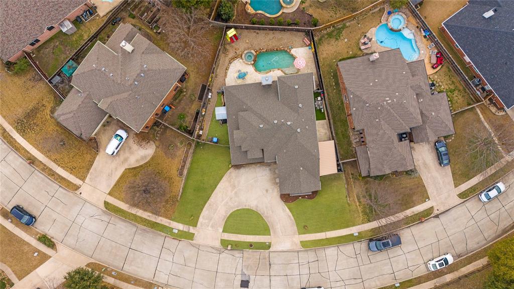 5914 Ambassador Lane Rowlett, TX 75089 - Photo 38 of 40 an aerial view of a house with a swimming pool