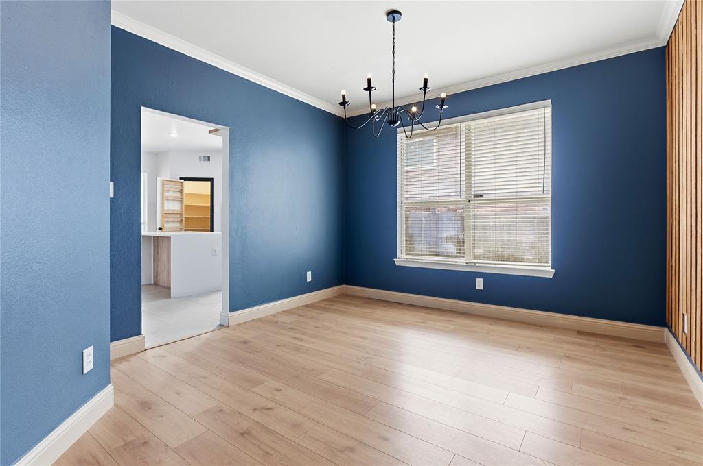5914 Ambassador Lane Rowlett, TX 75089 - Photo 4 of 40 a view of an empty room with a window
