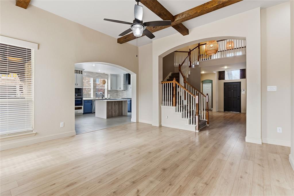 5914 Ambassador Lane Rowlett, TX 75089 - Photo 10 of 40 a view of a room with wooden floor and windows