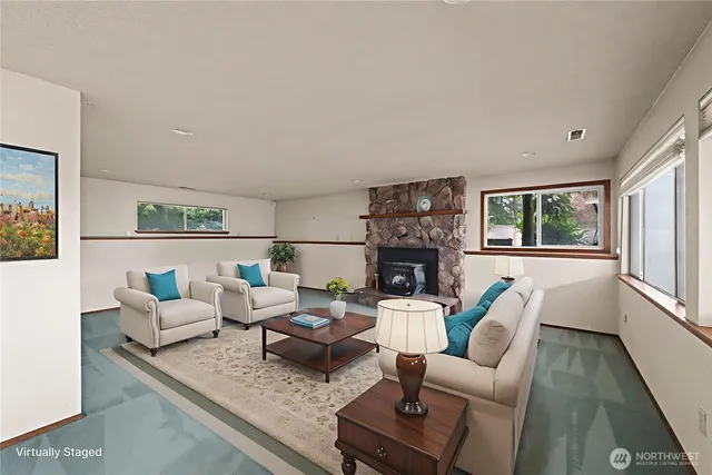 a view of an empty room with a fireplace