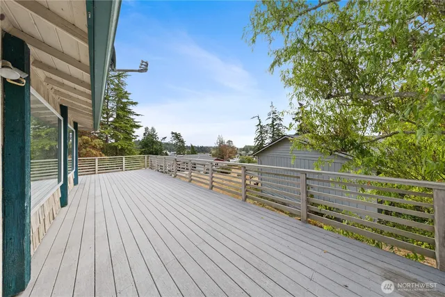 a view of a backyard with sitting area