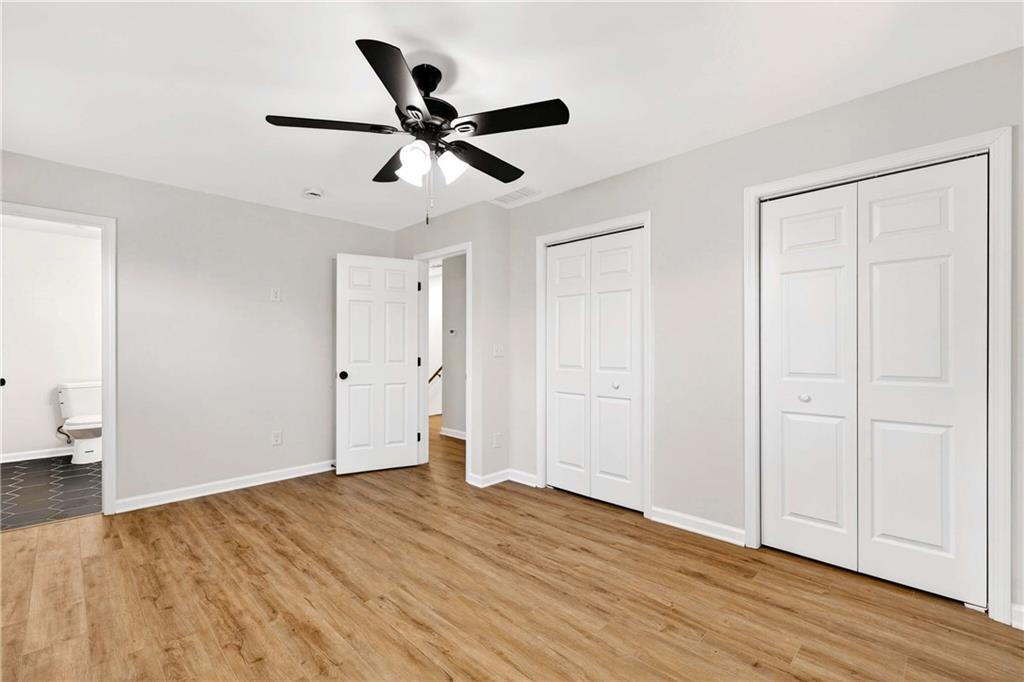 2497 Glenrock Drive Decatur, GA 30032 - Photo 28 of 42 a view of empty room with wooden floor