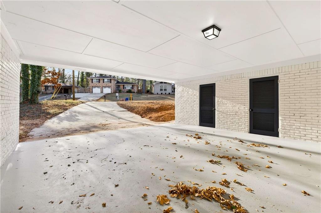 2497 Glenrock Drive Decatur, GA 30032 - Photo 31 of 42 a swimming pool with yard and seating space
