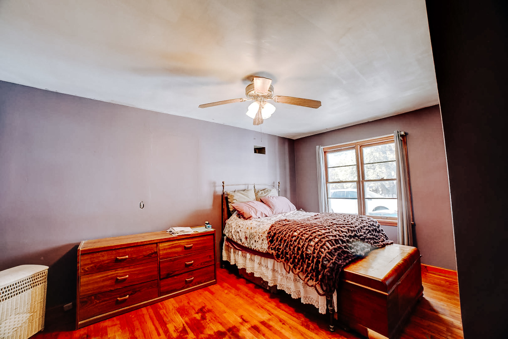615 South 5th Street Watseka, IL 60970 - Photo 17 of 26 a bedroom with a bed and window