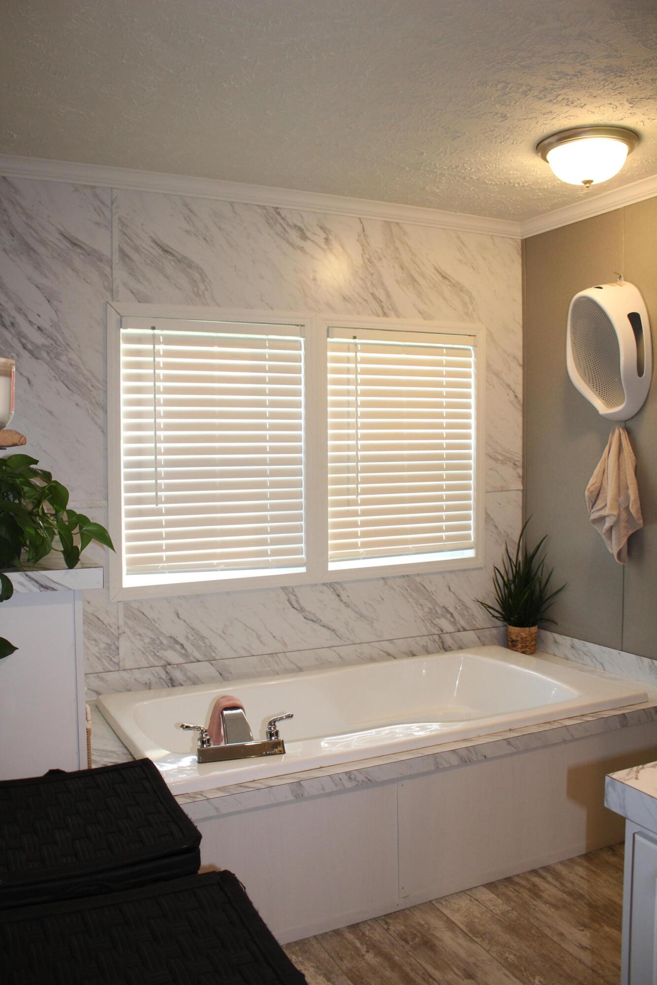 658 Stone Road Benton, TN 37307 - Photo 7 of 30 a bathroom with a bathtub and a shower