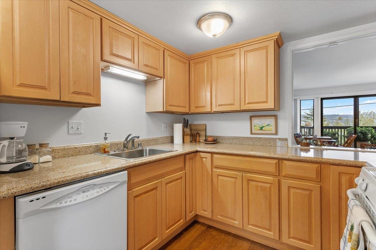 19100 Crest Avenue, Unit 15 Castro Valley, CA 94546 - Photo 13 of 33 a kitchen with sink cabinets and a window