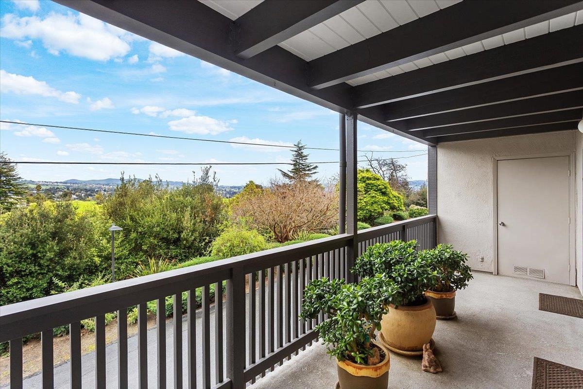 19100 Crest Avenue, Unit 15 Castro Valley, CA 94546 - Photo 20 of 33 a view of a balcony with flower plants