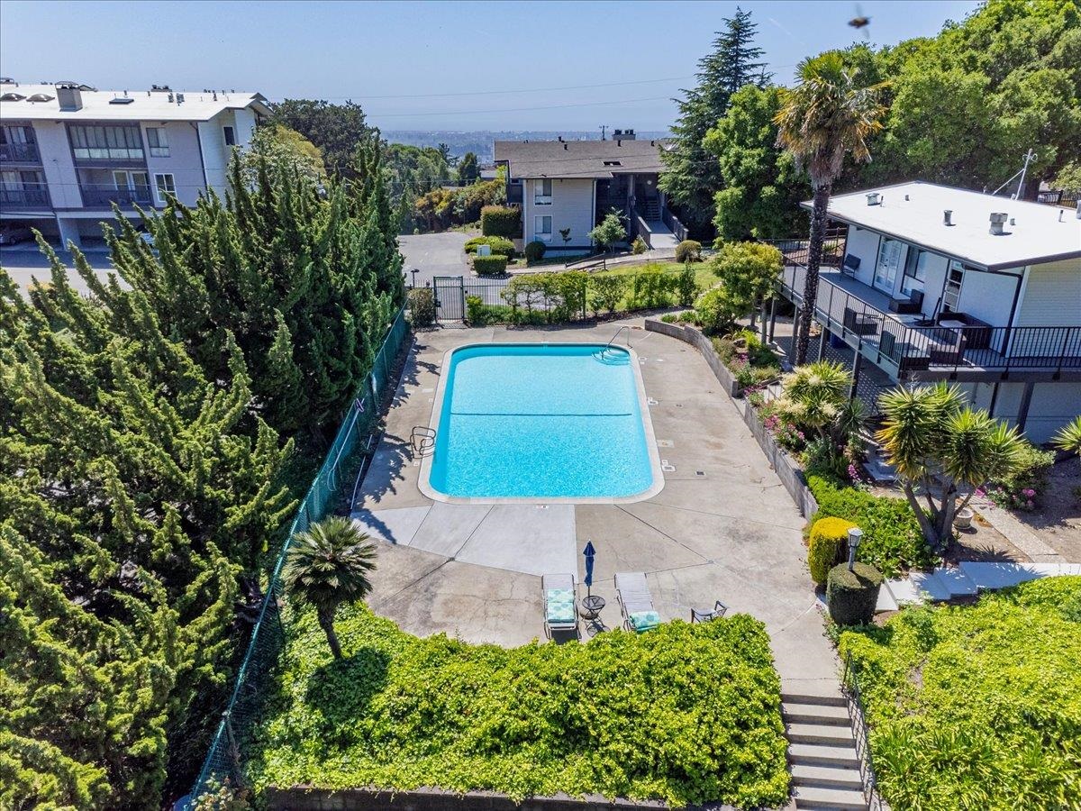 19100 Crest Avenue, Unit 15 Castro Valley, CA 94546 - Photo 26 of 33 an aerial view of a house with a yard and outdoor seating