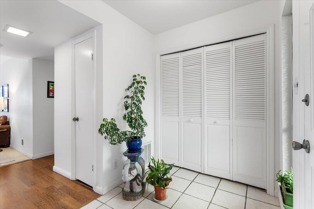 19100 Crest Avenue, Unit 15 Castro Valley, CA 94546 - Photo 5 of 33 a view of a potted plant in a hallway