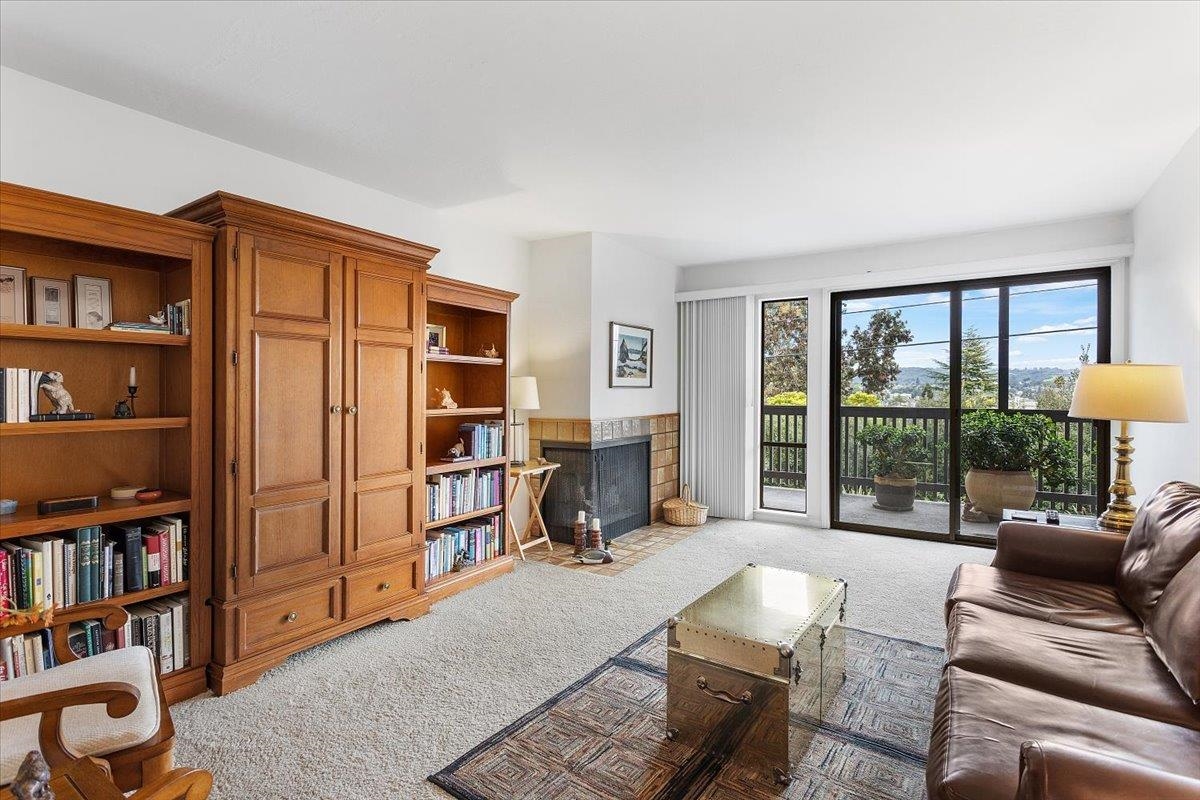 19100 Crest Avenue, Unit 15 Castro Valley, CA 94546 - Photo 6 of 33 a living room with furniture and a book shelf