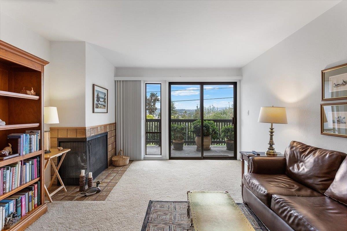 19100 Crest Avenue, Unit 15 Castro Valley, CA 94546 - Photo 8 of 33 a living room with furniture and a book shelf