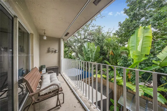 a view of a balcony with chair