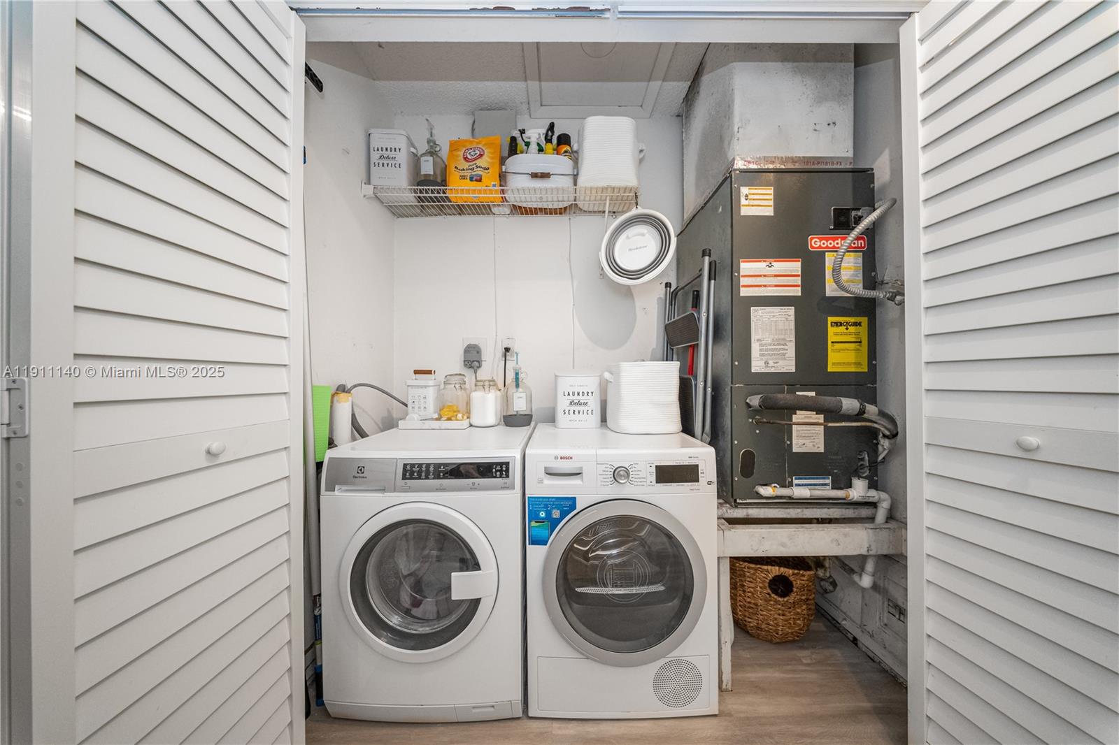 3130 Bird Avenue, Unit 12 Miami, FL 33133 - Photo 21 of 23 a utility room with dryer and washer