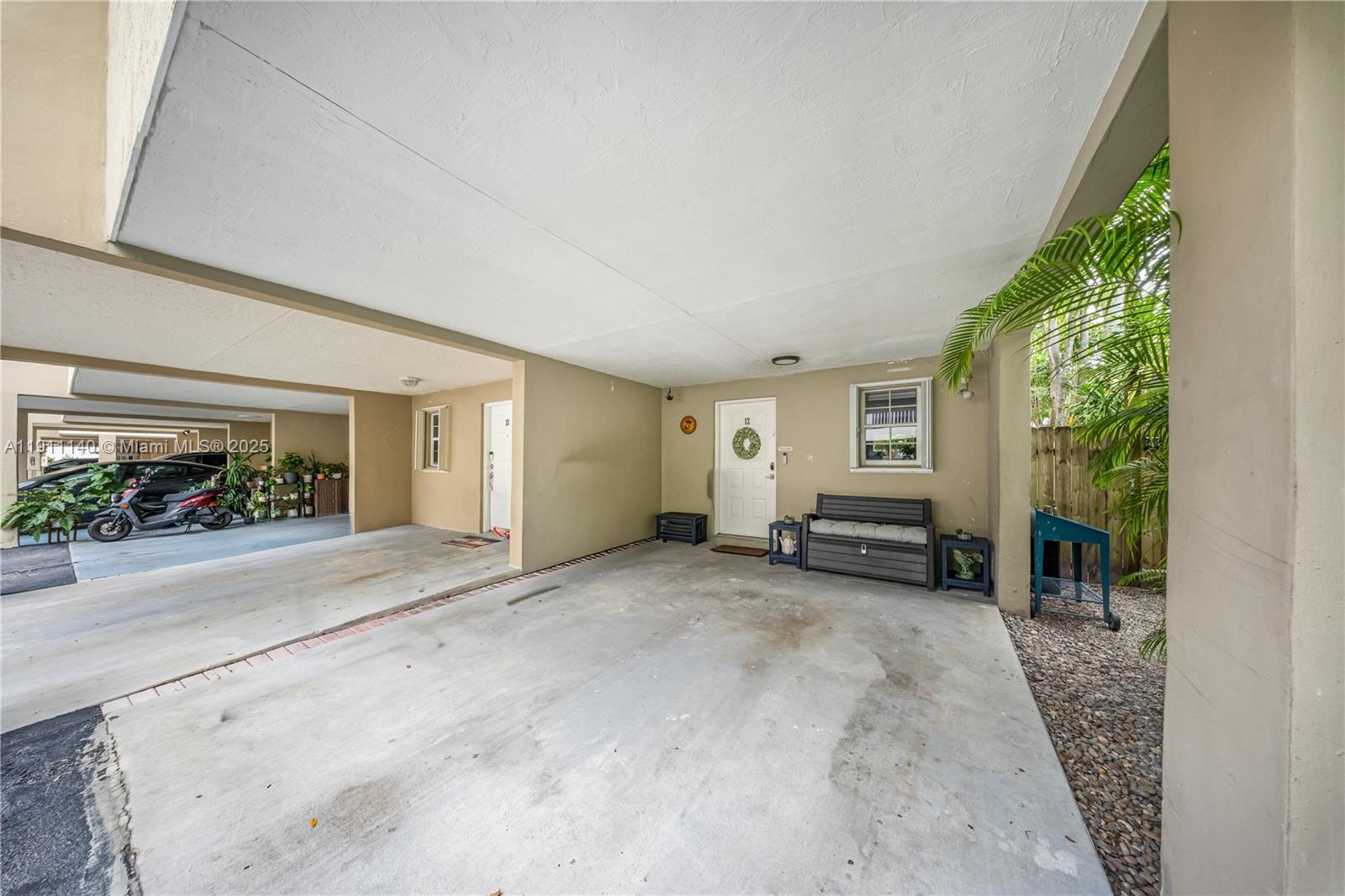 3130 Bird Avenue, Unit 12 Miami, FL 33133 - Photo 3 of 23 a view of a house with garden and sitting area