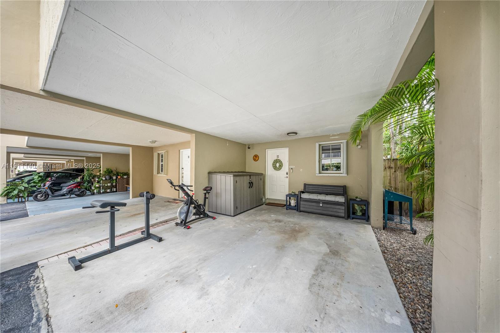 3130 Bird Avenue, Unit 12 Miami, FL 33133 - Photo 4 of 23 a view of a livingroom with furniture and floor to ceiling window