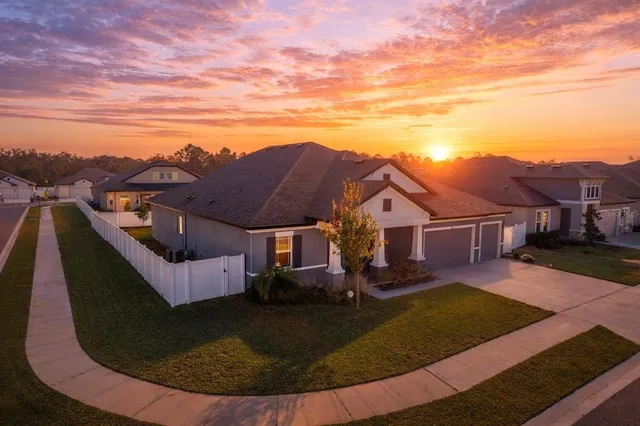 front view of a house with a yard