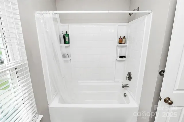 a bathroom with a bathtub