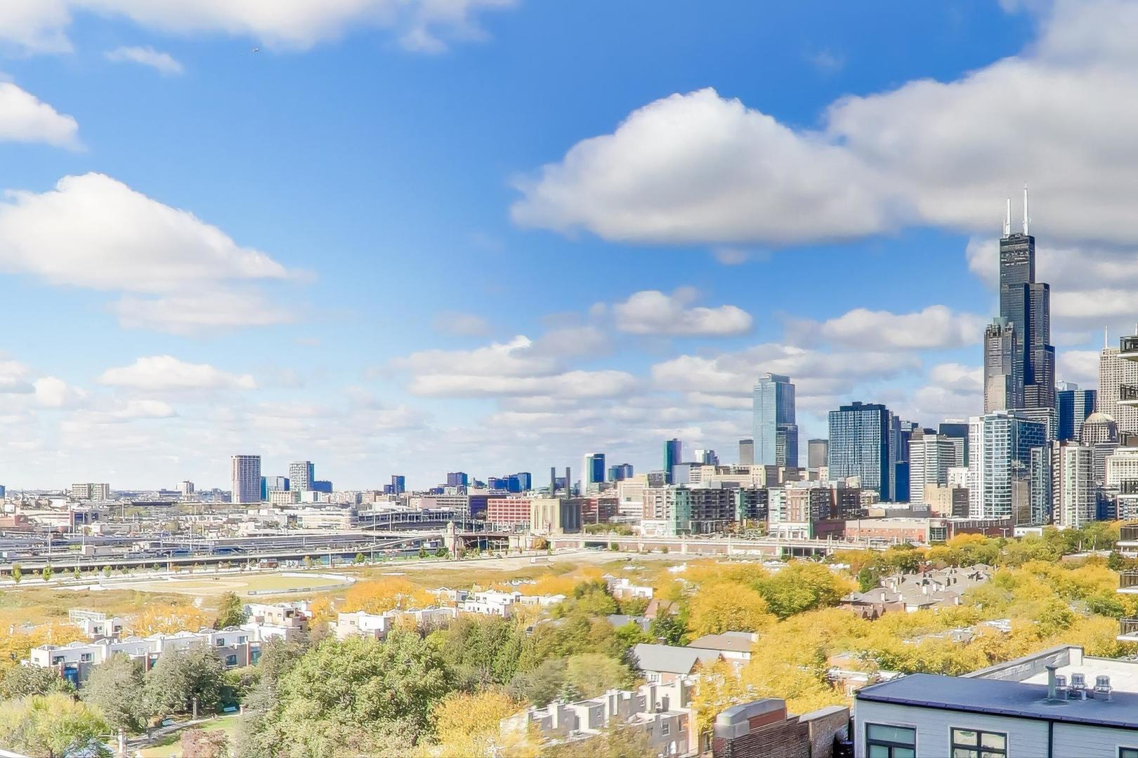 1529 South State Street, Unit 14J Chicago, IL 60605 - Photo 27 of 30 a view of a swimming pool and an outdoor seating
