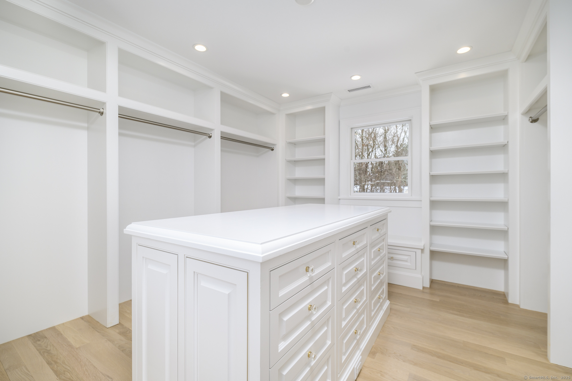40 Hoyclo Road Stamford, CT 06903 - Photo 27 of 38 a bathroom with a sink and a mirror