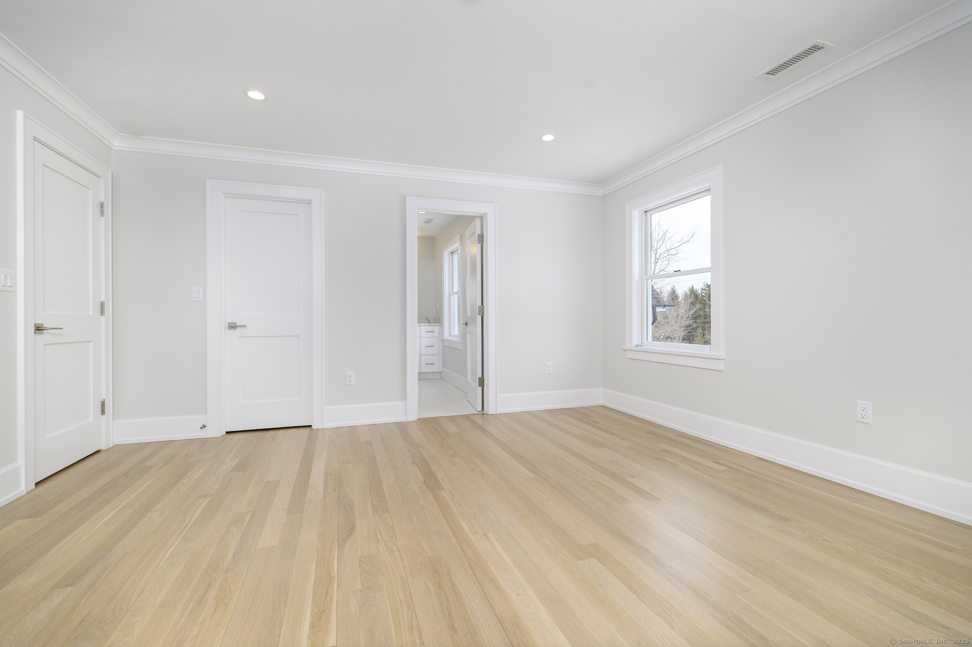 40 Hoyclo Road Stamford, CT 06903 - Photo 33 of 38 a view of empty room with wooden floor and fan