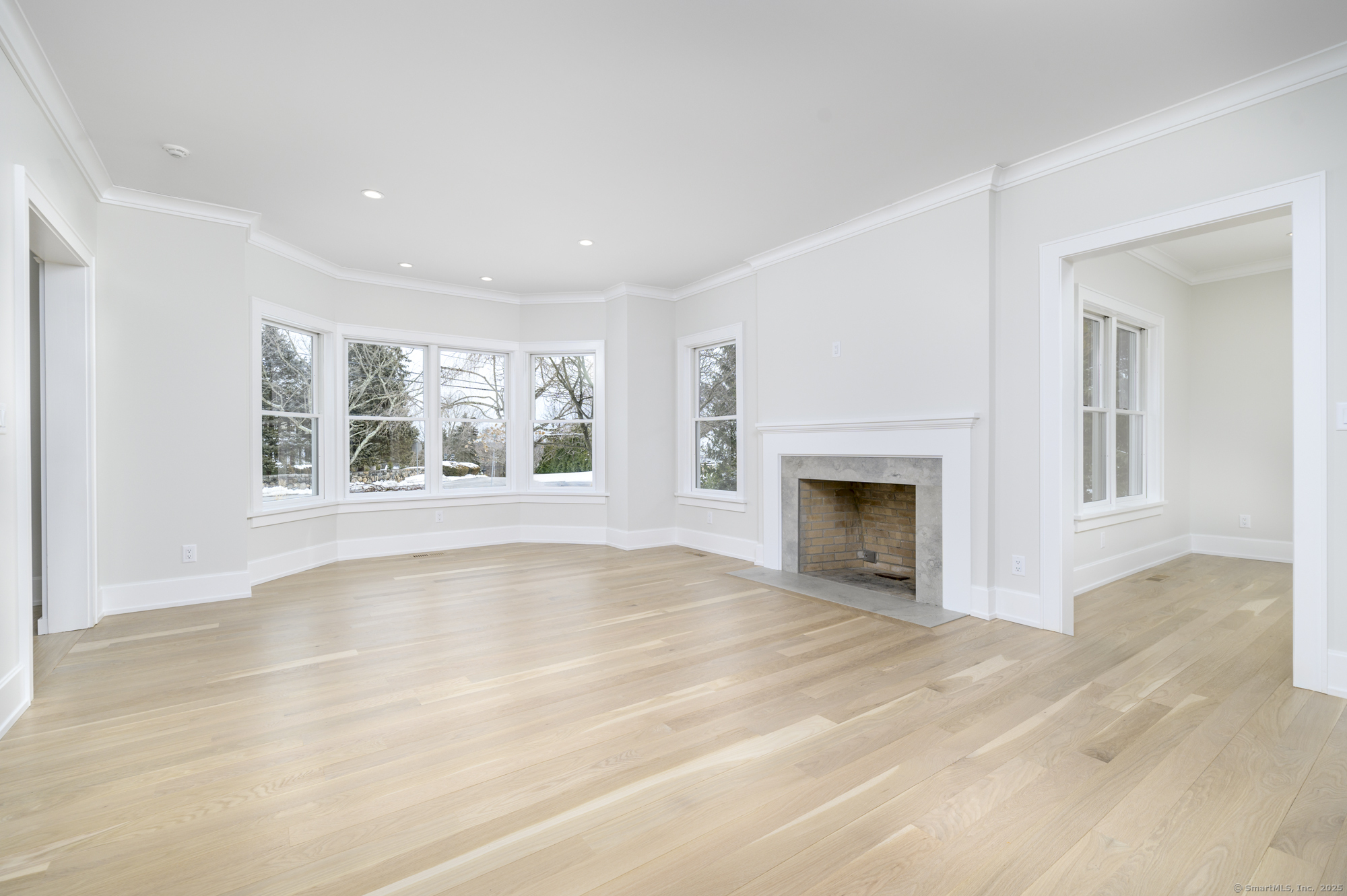 40 Hoyclo Road Stamford, CT 06903 - Photo 6 of 38 a view of an empty room with a window