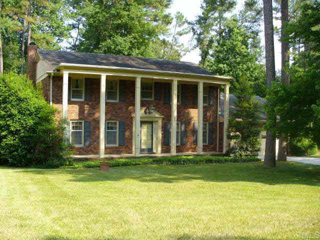 6900 Buckhead Drive Raleigh, NC 27615 - Photo 1 of 10 a front view of house with yard and green space