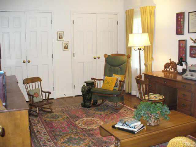 6900 Buckhead Drive Raleigh, NC 27615 - Photo 6 of 10 a living room with furniture and a window