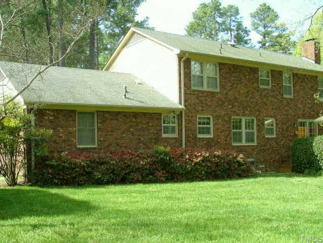 6900 Buckhead Drive Raleigh, NC 27615 - Photo 8 of 10 a view of a house with a garden
