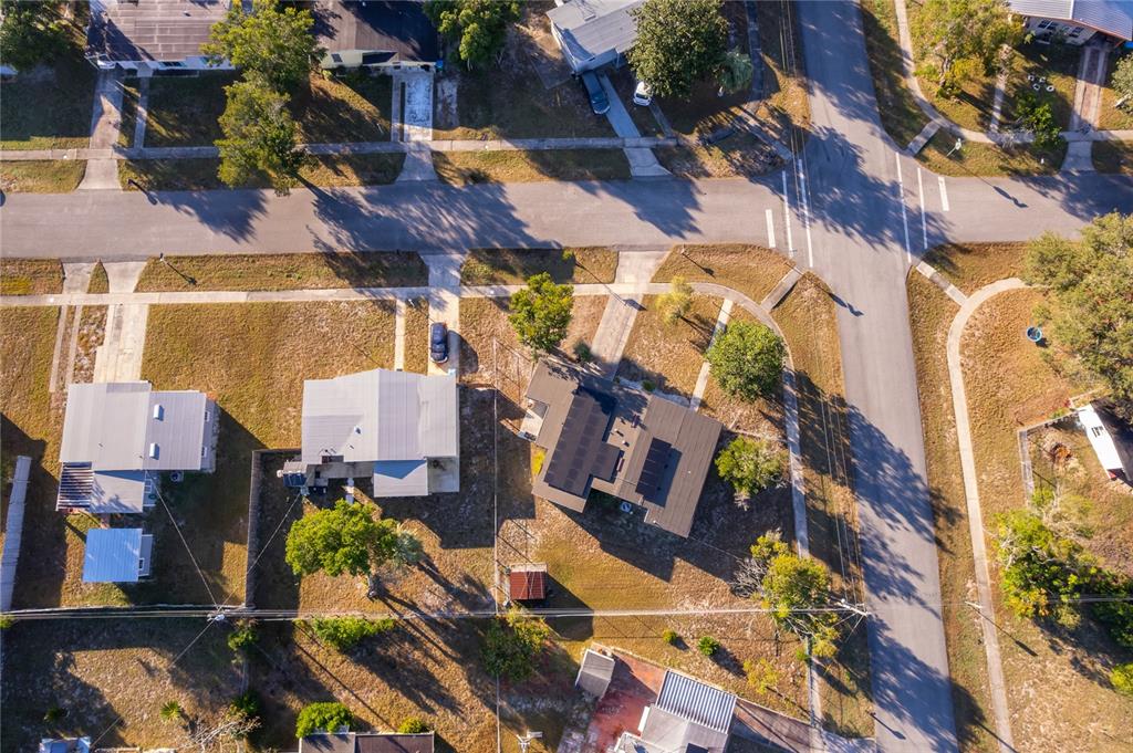 944 Halstead Street Deltona, FL 32725 - Photo 3 of 28 an aerial view of residential houses with outdoor space