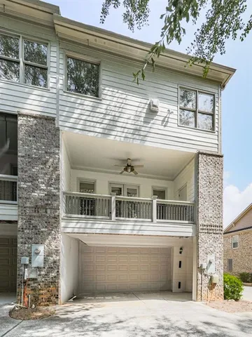 a front view of a house with a balcony