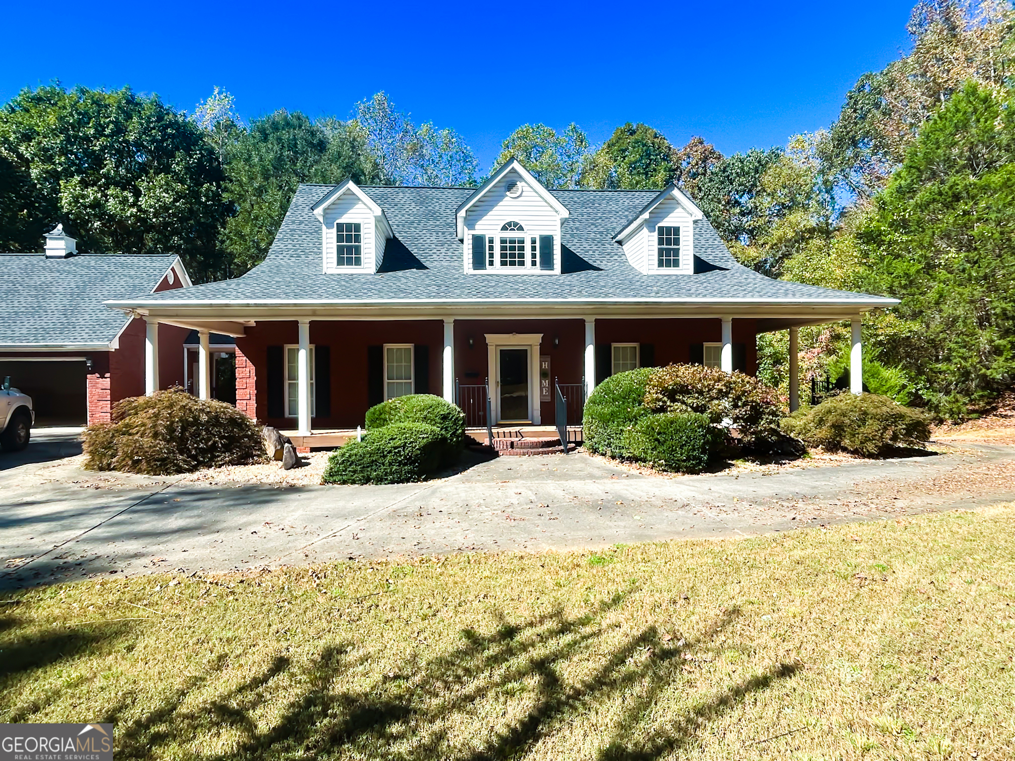 1136 Cole Lake Road Dallas, GA 30157 - Photo 1 of 57 a front view of a house with a yard