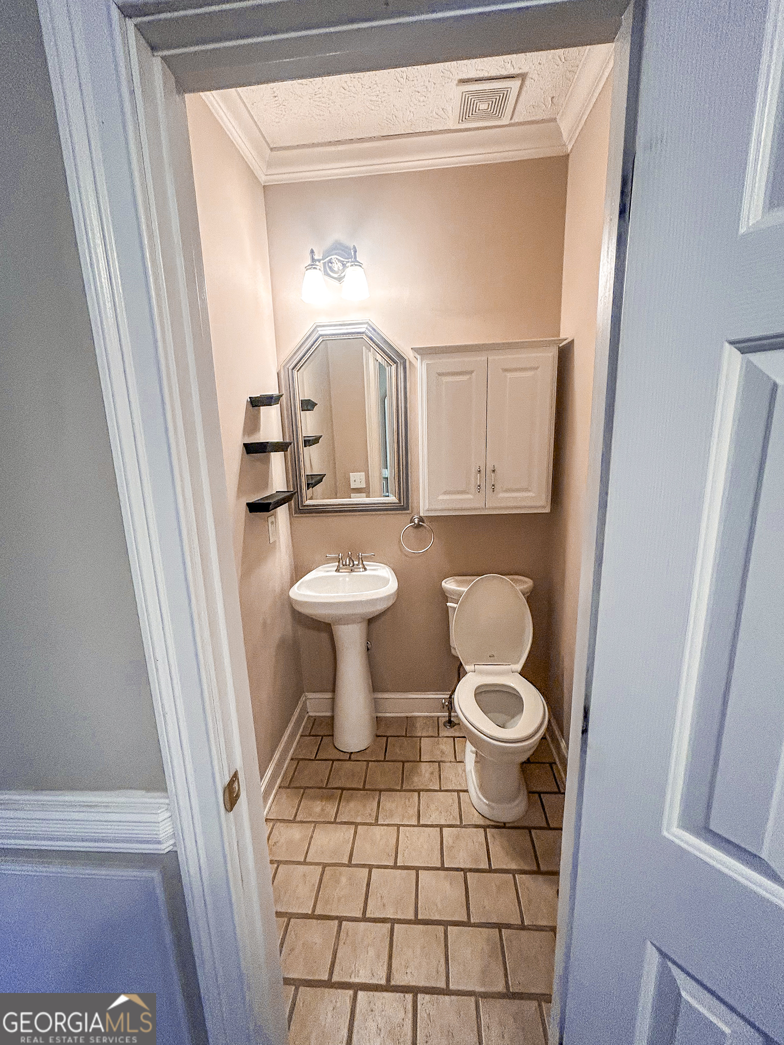 1136 Cole Lake Road Dallas, GA 30157 - Photo 11 of 57 a bathroom with a sink toilet and a mirror