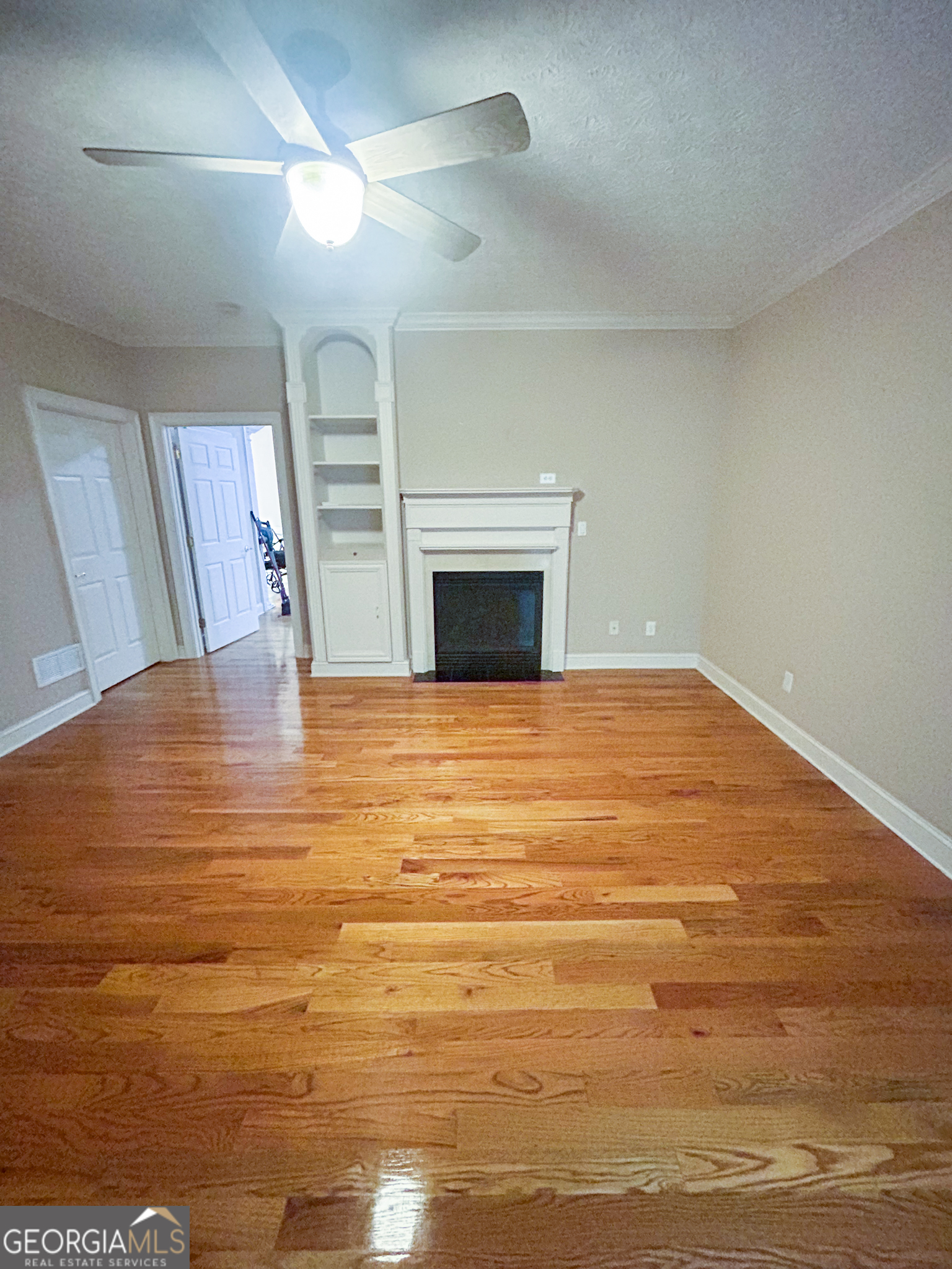 1136 Cole Lake Road Dallas, GA 30157 - Photo 23 of 57 a view of empty room with wooden floor