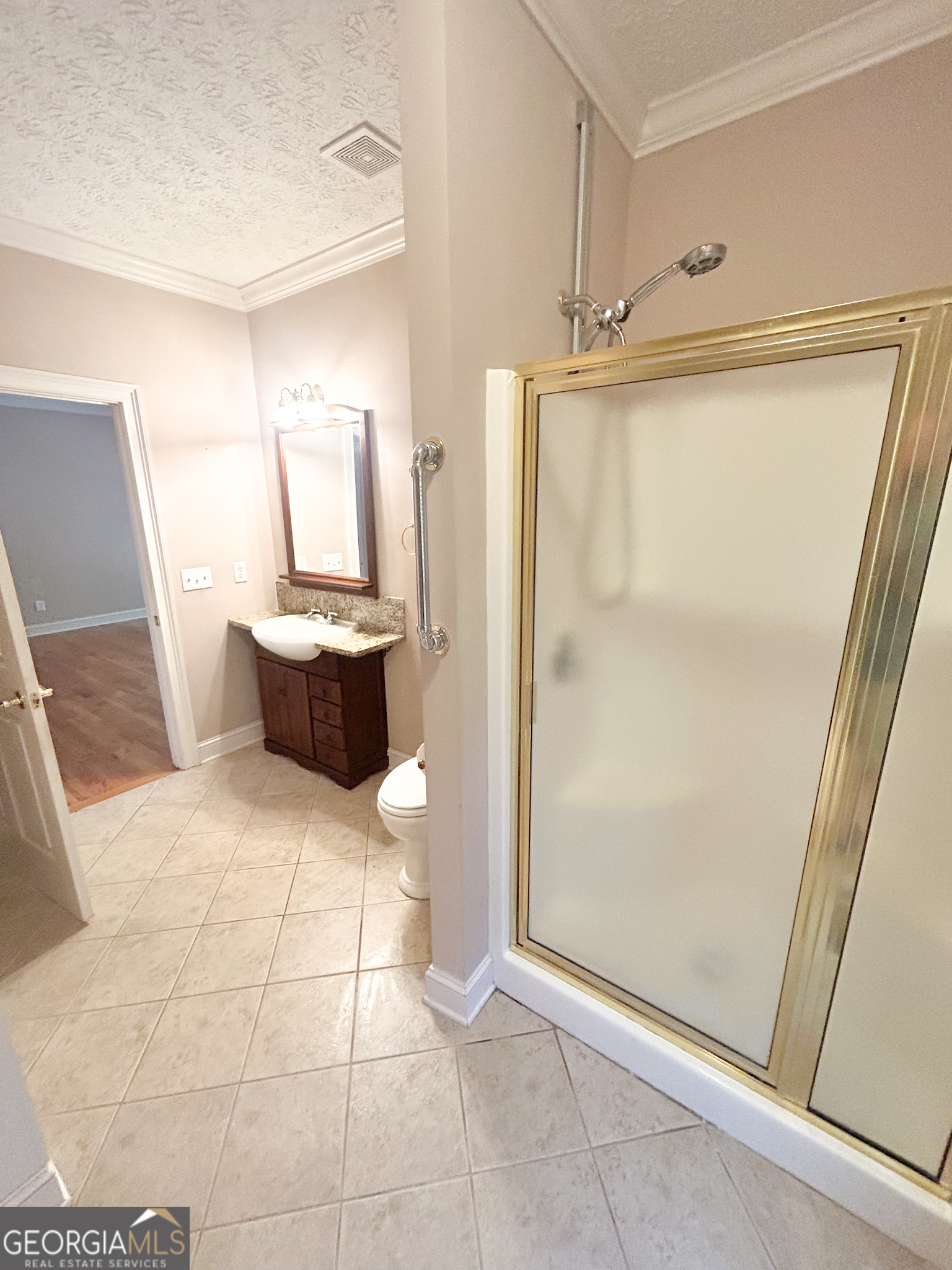 1136 Cole Lake Road Dallas, GA 30157 - Photo 28 of 57 a bathroom with a shower and a toilet