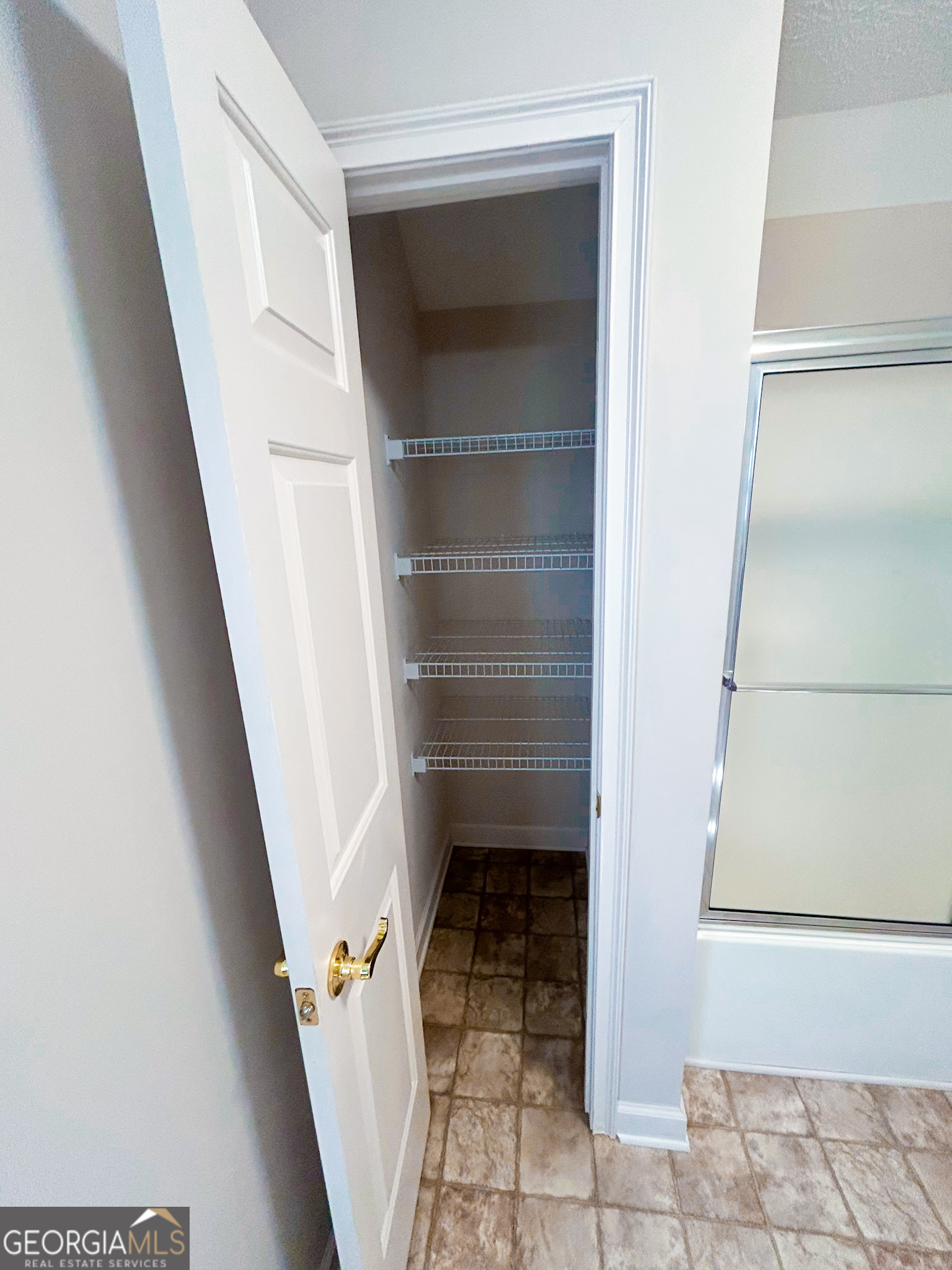 1136 Cole Lake Road Dallas, GA 30157 - Photo 32 of 57 a view of an empty walk in closet