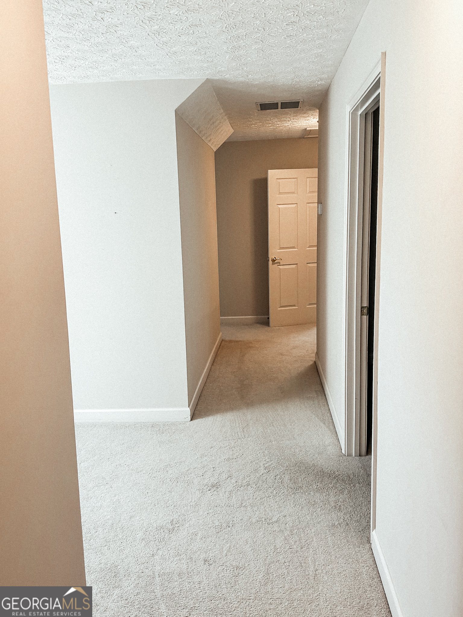 1136 Cole Lake Road Dallas, GA 30157 - Photo 35 of 57 a view of a hallway to an empty room