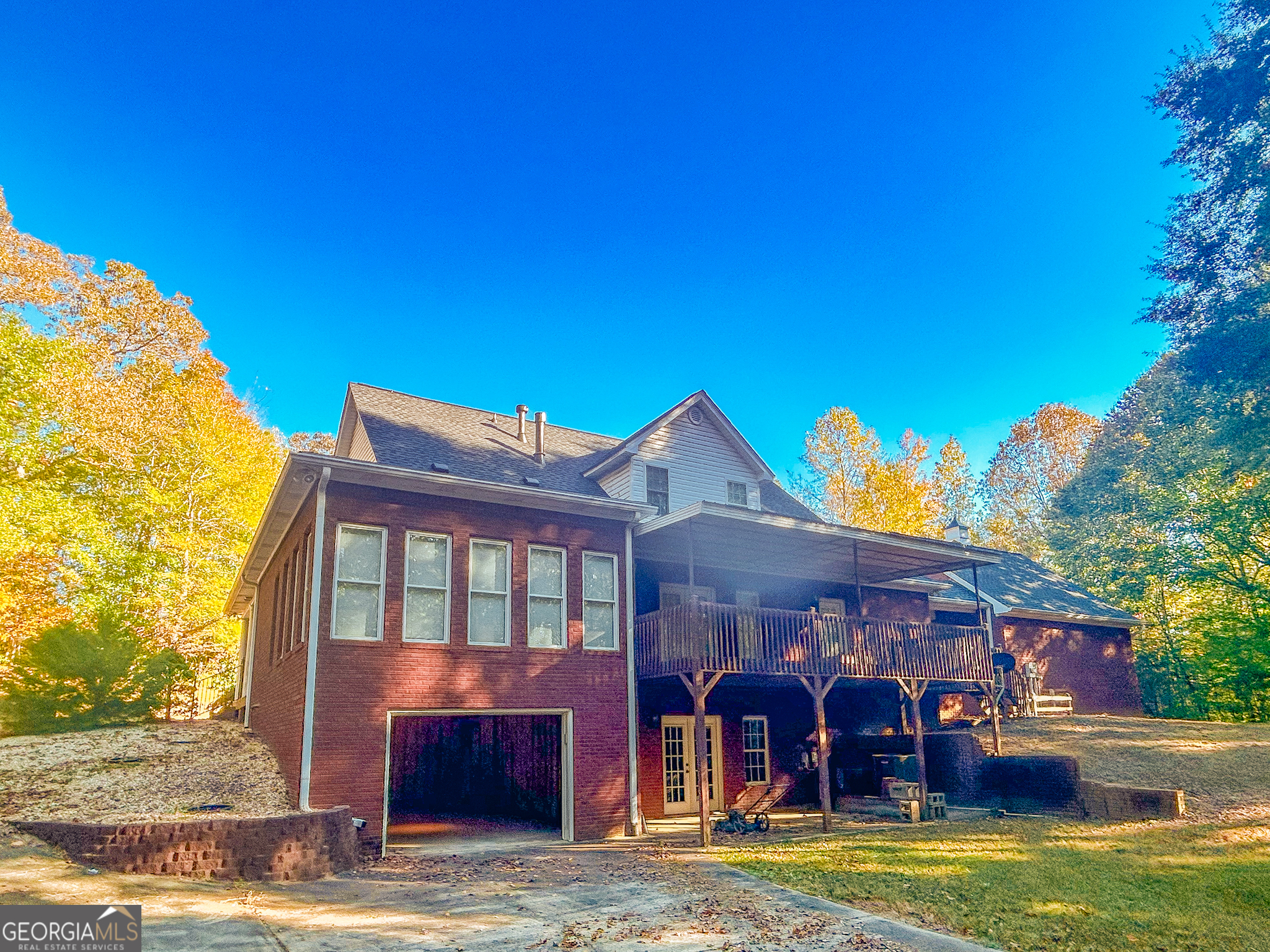 1136 Cole Lake Road Dallas, GA 30157 - Photo 4 of 57 a front view of a building with garden