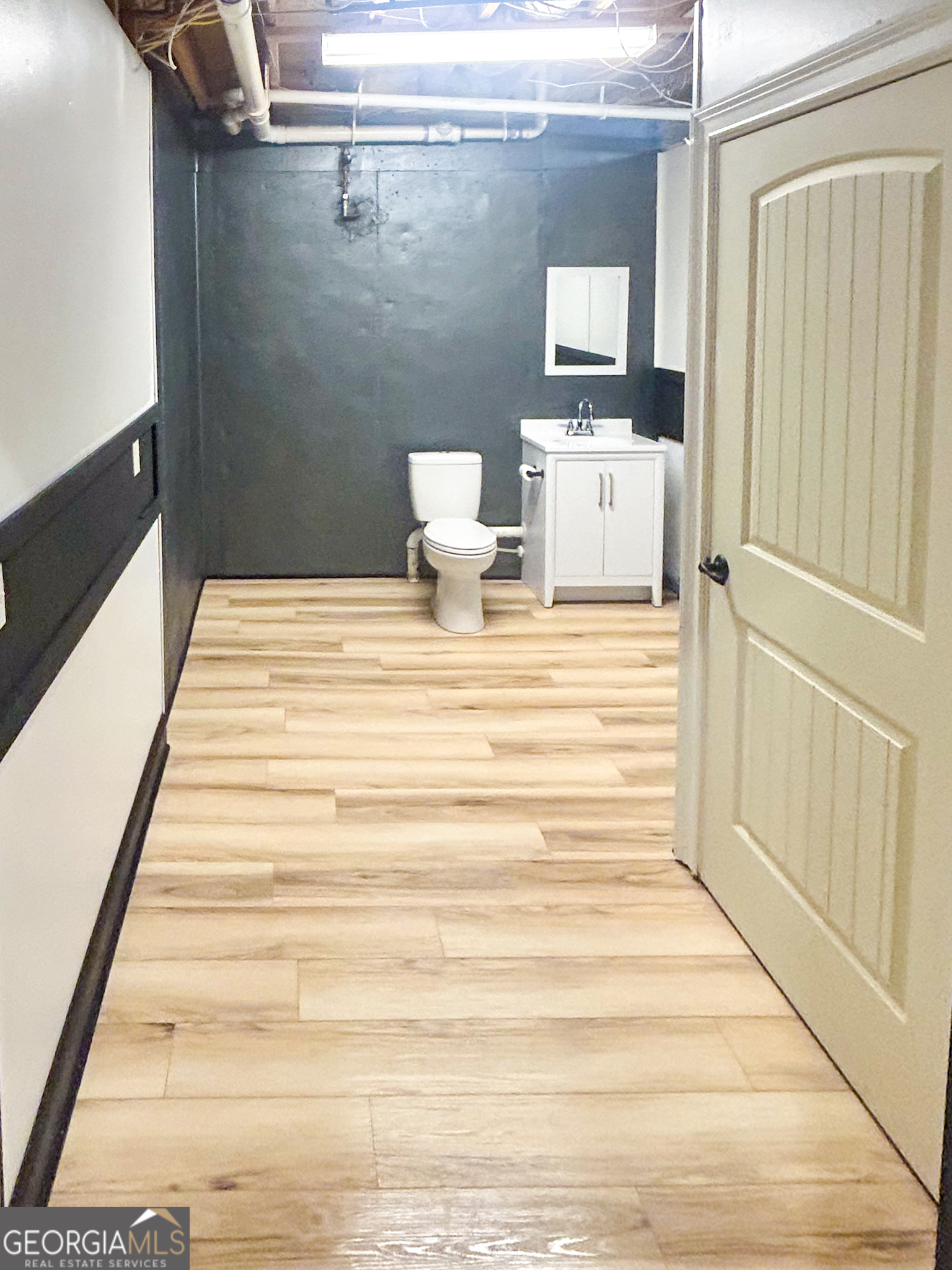 1136 Cole Lake Road Dallas, GA 30157 - Photo 50 of 57 a bathroom with a sink and a mirror