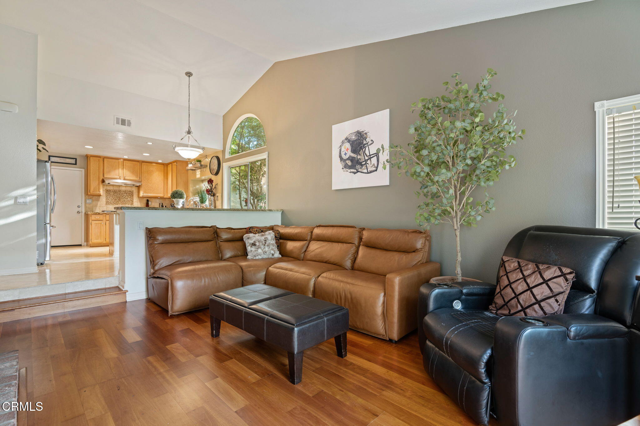 1501 Devonshire Drive Oxnard, CA 93030 - Photo 12 of 39 a living room with furniture a window and a fireplace