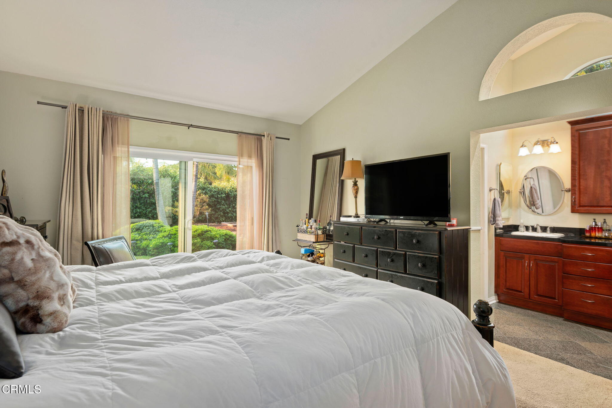 1501 Devonshire Drive Oxnard, CA 93030 - Photo 18 of 39 a bedroom with a bed and a flat screen tv