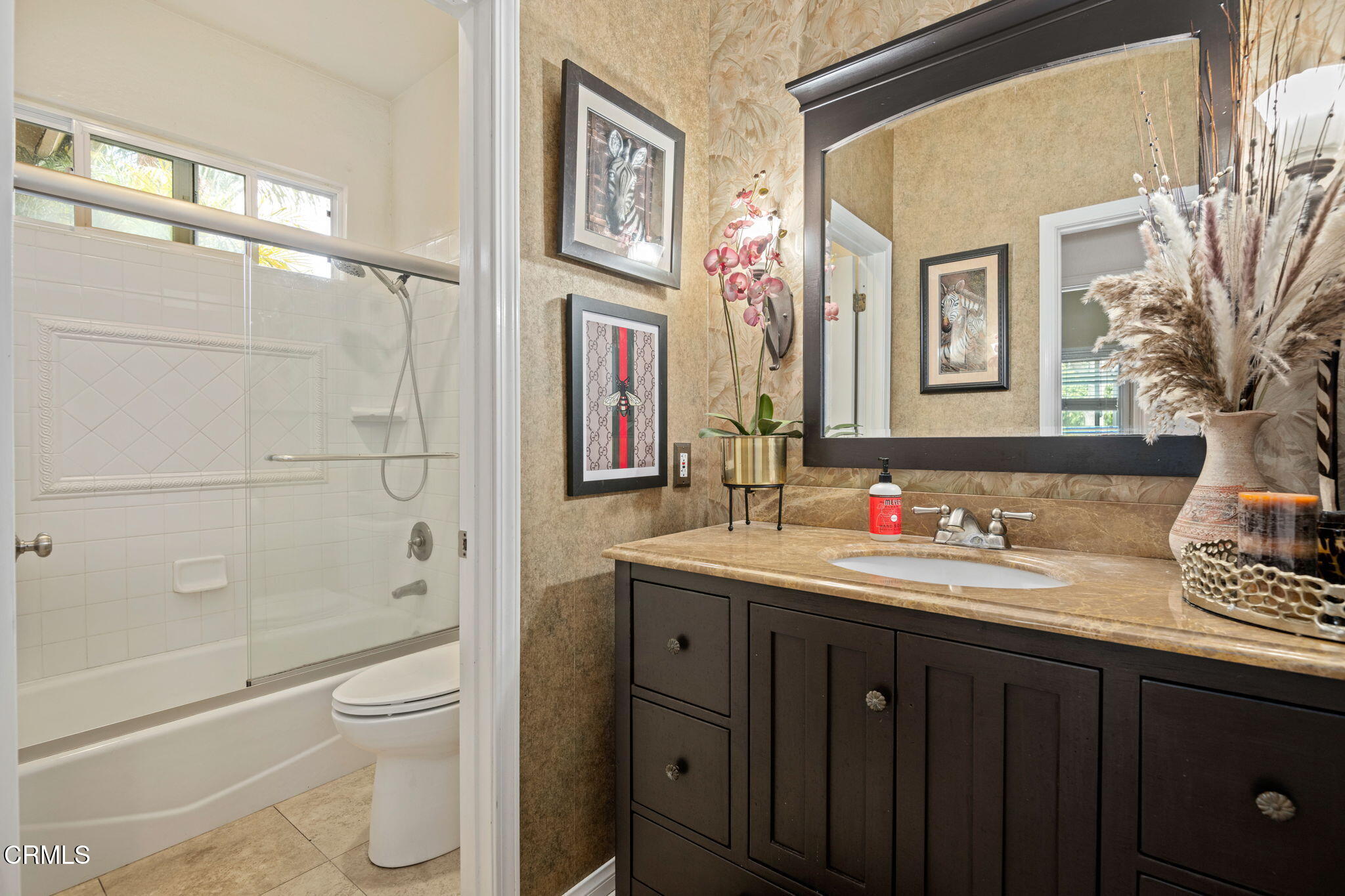 1501 Devonshire Drive Oxnard, CA 93030 - Photo 23 of 39 a bathroom with a double vanity sink toilet mirror and shower